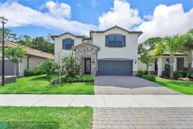Beautifully upgraded pool home on the golf course. Boasting 4 on Woodmont Country Club in Florida - for sale on GolfHomes.com, golf home, golf lot