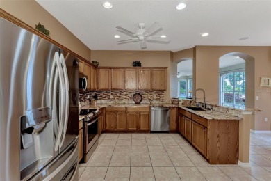 HERON CREEK VILLA ON THE LAKE! Welcome to your dream retreat in on Heron Creek Golf and Country Club in Florida - for sale on GolfHomes.com, golf home, golf lot