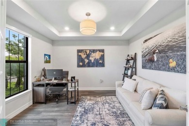 Beautifully upgraded pool home on the golf course. Boasting 4 on Woodmont Country Club in Florida - for sale on GolfHomes.com, golf home, golf lot
