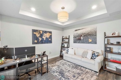 Beautifully upgraded pool home on the golf course. Boasting 4 on Woodmont Country Club in Florida - for sale on GolfHomes.com, golf home, golf lot