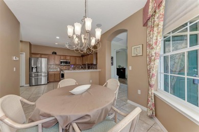 HERON CREEK VILLA ON THE LAKE! Welcome to your dream retreat in on Heron Creek Golf and Country Club in Florida - for sale on GolfHomes.com, golf home, golf lot