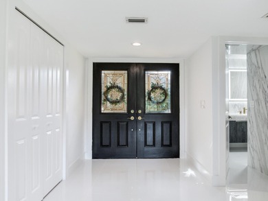 Welcome to this luxury villa located in the prestigious 24-hour on Cypress Run Golf Club  in Florida - for sale on GolfHomes.com, golf home, golf lot