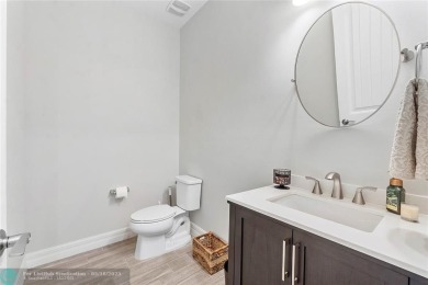 Beautifully upgraded pool home on the golf course. Boasting 4 on Woodmont Country Club in Florida - for sale on GolfHomes.com, golf home, golf lot