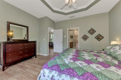 HERON CREEK VILLA ON THE LAKE! Welcome to your dream retreat in on Heron Creek Golf and Country Club in Florida - for sale on GolfHomes.com, golf home, golf lot