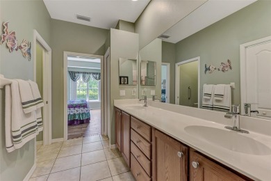 HERON CREEK VILLA ON THE LAKE! Welcome to your dream retreat in on Heron Creek Golf and Country Club in Florida - for sale on GolfHomes.com, golf home, golf lot