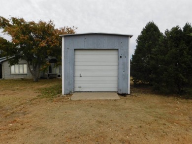 Discover this beautiful 3-bedroom, 2.5-bath home, perfectly on Blackmer Municipal Golf Course in Oklahoma - for sale on GolfHomes.com, golf home, golf lot