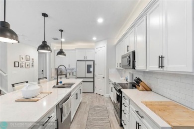 Beautifully upgraded pool home on the golf course. Boasting 4 on Woodmont Country Club in Florida - for sale on GolfHomes.com, golf home, golf lot
