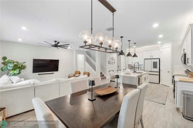 Beautifully upgraded pool home on the golf course. Boasting 4 on Woodmont Country Club in Florida - for sale on GolfHomes.com, golf home, golf lot