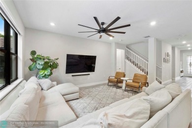 Beautifully upgraded pool home on the golf course. Boasting 4 on Woodmont Country Club in Florida - for sale on GolfHomes.com, golf home, golf lot