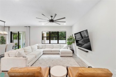 Beautifully upgraded pool home on the golf course. Boasting 4 on Woodmont Country Club in Florida - for sale on GolfHomes.com, golf home, golf lot