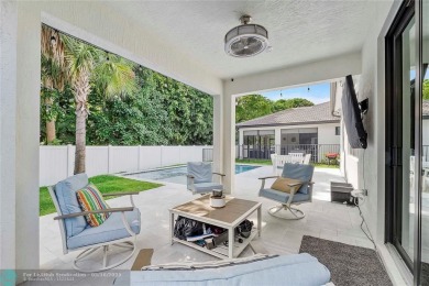 Beautifully upgraded pool home on the golf course. Boasting 4 on Woodmont Country Club in Florida - for sale on GolfHomes.com, golf home, golf lot