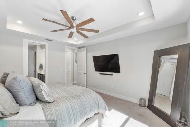 Beautifully upgraded pool home on the golf course. Boasting 4 on Woodmont Country Club in Florida - for sale on GolfHomes.com, golf home, golf lot