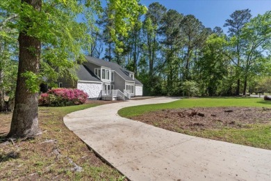 Introducing a truly unique West Lake Community residence crafted on West Lake Country Club in Georgia - for sale on GolfHomes.com, golf home, golf lot