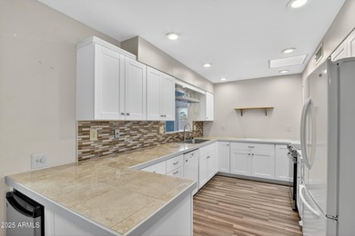 Beautifully updated 3-bedroom, 2-bath home in the heart of Sun on PalmBrook Country Club in Arizona - for sale on GolfHomes.com, golf home, golf lot