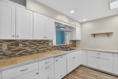 Beautifully updated 3-bedroom, 2-bath home in the heart of Sun on PalmBrook Country Club in Arizona - for sale on GolfHomes.com, golf home, golf lot