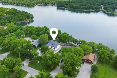 ABSOLUTELY GORGEOUS RANCH ON THE LAKE WITH FLOATING DOCK!!! Best on Linn Valley Lakes - Deer Trace Golf Course in Kansas - for sale on GolfHomes.com, golf home, golf lot