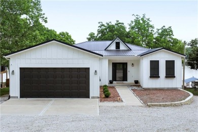 ABSOLUTELY GORGEOUS RANCH ON THE LAKE WITH FLOATING DOCK!!! Best on Linn Valley Lakes - Deer Trace Golf Course in Kansas - for sale on GolfHomes.com, golf home, golf lot