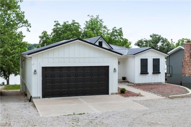 ABSOLUTELY GORGEOUS RANCH ON THE LAKE WITH FLOATING DOCK!!! Best on Linn Valley Lakes - Deer Trace Golf Course in Kansas - for sale on GolfHomes.com, golf home, golf lot