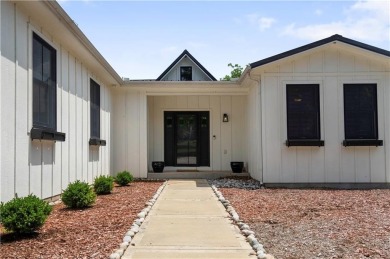 ABSOLUTELY GORGEOUS RANCH ON THE LAKE WITH FLOATING DOCK!!! Best on Linn Valley Lakes - Deer Trace Golf Course in Kansas - for sale on GolfHomes.com, golf home, golf lot