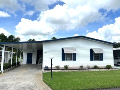 This stunning 2-bedroom, 2-bath, 1,456 sq. ft. home is perfectly on Crystal Lake Club in Florida - for sale on GolfHomes.com, golf home, golf lot