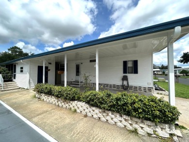 This stunning 2-bedroom, 2-bath, 1,456 sq. ft. home is perfectly on Crystal Lake Club in Florida - for sale on GolfHomes.com, golf home, golf lot