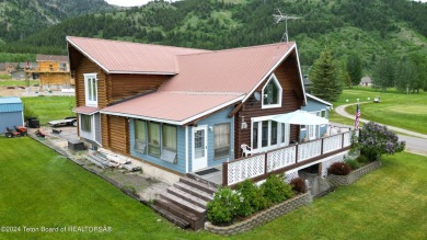 This expansive 5 bed, 3 bath log home offers a perfect blend of on Cedar Creek Golf Course in Wyoming - for sale on GolfHomes.com, golf home, golf lot