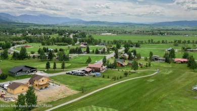 This expansive 5 bed, 3 bath log home offers a perfect blend of on Cedar Creek Golf Course in Wyoming - for sale on GolfHomes.com, golf home, golf lot