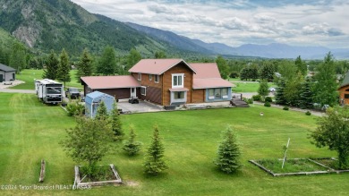 This expansive 5 bed, 3 bath log home offers a perfect blend of on Cedar Creek Golf Course in Wyoming - for sale on GolfHomes.com, golf home, golf lot