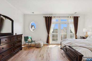 This expansive 2,150 sq ft home built in 2005 offers the perfect on Liberty National in New Jersey - for sale on GolfHomes.com, golf home, golf lot