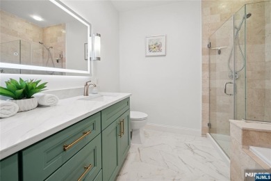 This expansive 2,150 sq ft home built in 2005 offers the perfect on Liberty National in New Jersey - for sale on GolfHomes.com, golf home, golf lot