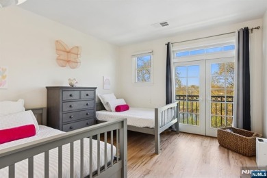 This expansive 2,150 sq ft home built in 2005 offers the perfect on Liberty National in New Jersey - for sale on GolfHomes.com, golf home, golf lot