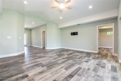 Coastal Charm Meets Modern Comfort in Rotonda Heights! Welcome on Rotonda Golf and Country Club The Palms Course in Florida - for sale on GolfHomes.com, golf home, golf lot