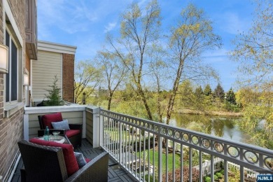 This expansive 2,150 sq ft home built in 2005 offers the perfect on Liberty National in New Jersey - for sale on GolfHomes.com, golf home, golf lot