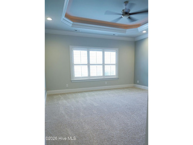 Step inside this luxury coastal craftsman, pristine Riptide home on Sea Trail Golf Resort in North Carolina - for sale on GolfHomes.com, golf home, golf lot