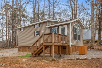 Come see this well-maintained 2017 park model camper located on on River Golf and Country Club at Lake Royale in North Carolina - for sale on GolfHomes.com, golf home, golf lot