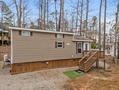 Come see this well-maintained 2017 park model camper located on on River Golf and Country Club at Lake Royale in North Carolina - for sale on GolfHomes.com, golf home, golf lot