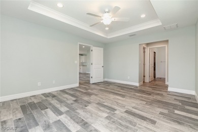 Coastal Charm Meets Modern Comfort in Rotonda Heights! Welcome on Rotonda Golf and Country Club The Palms Course in Florida - for sale on GolfHomes.com, golf home, golf lot