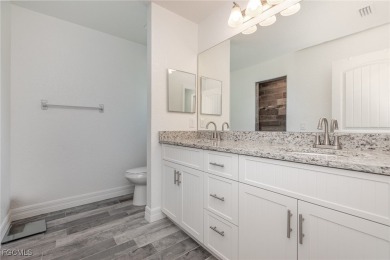 Coastal Charm Meets Modern Comfort in Rotonda Heights! Welcome on Rotonda Golf and Country Club The Palms Course in Florida - for sale on GolfHomes.com, golf home, golf lot