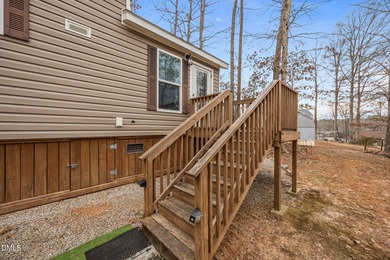 Come see this well-maintained 2017 park model camper located on on River Golf and Country Club at Lake Royale in North Carolina - for sale on GolfHomes.com, golf home, golf lot