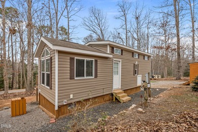 Come see this well-maintained 2017 park model camper located on on River Golf and Country Club at Lake Royale in North Carolina - for sale on GolfHomes.com, golf home, golf lot