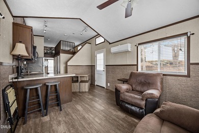 Come see this well-maintained 2017 park model camper located on on River Golf and Country Club at Lake Royale in North Carolina - for sale on GolfHomes.com, golf home, golf lot