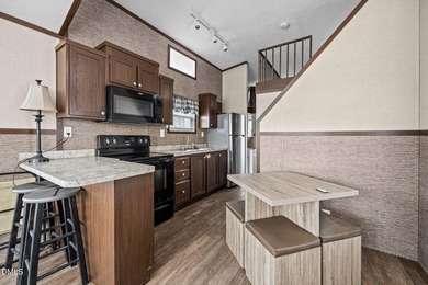 Come see this well-maintained 2017 park model camper located on on River Golf and Country Club at Lake Royale in North Carolina - for sale on GolfHomes.com, golf home, golf lot