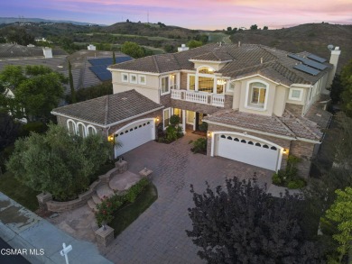 Welcome to a masterpiece of Mediterranean elegance located in on Moorpark Country Club in California - for sale on GolfHomes.com, golf home, golf lot