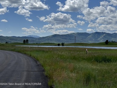 Wonderful home site in Teton Springs backing to a lake.  Imagine on Teton Springs Resort and Club in Idaho - for sale on GolfHomes.com, golf home, golf lot