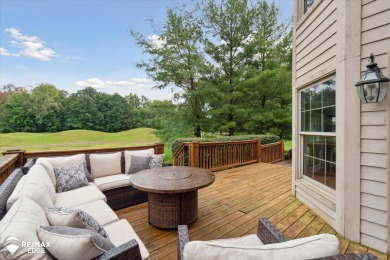 This stunning 5-bedroom, 3-bathroom home spans over 3,600 square on The Captains Club At Woodfield in Michigan - for sale on GolfHomes.com, golf home, golf lot