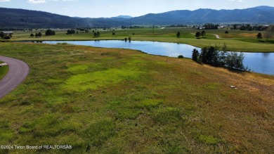 Wonderful home site in Teton Springs backing to a lake.  Imagine on Teton Springs Resort and Club in Idaho - for sale on GolfHomes.com, golf home, golf lot