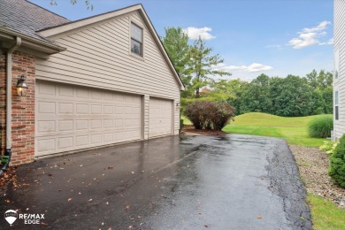 This stunning 5-bedroom, 3-bathroom home spans over 3,600 square on The Captains Club At Woodfield in Michigan - for sale on GolfHomes.com, golf home, golf lot