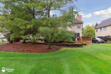 This stunning 5-bedroom, 3-bathroom home spans over 3,600 square on The Captains Club At Woodfield in Michigan - for sale on GolfHomes.com, golf home, golf lot