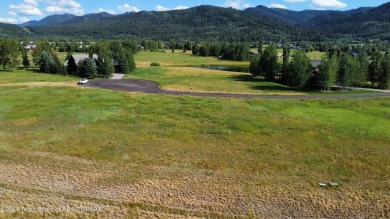 Wonderful home site in Teton Springs backing to a lake.  Imagine on Teton Springs Resort and Club in Idaho - for sale on GolfHomes.com, golf home, golf lot