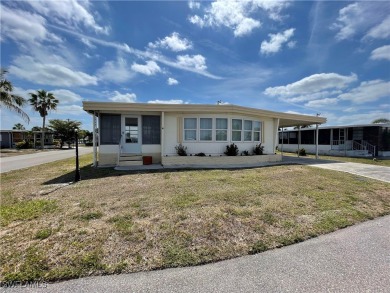 Welcome to your happy new home! This super cute house it sits on on Riverbend Golf and Country Club in Florida - for sale on GolfHomes.com, golf home, golf lot